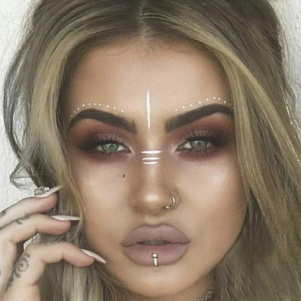 Gold Festival Face Tattoos